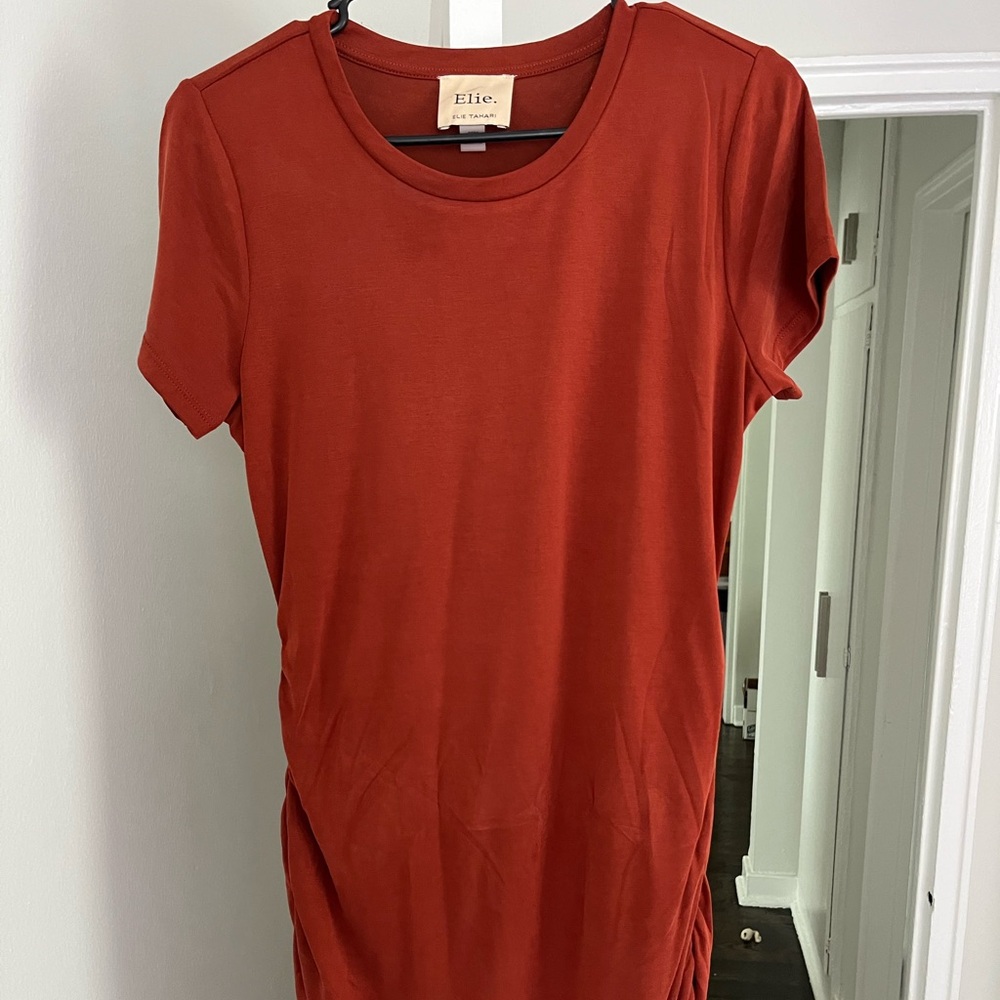 Elie Tahari dress, burnt orange color, size medium. 70% Modal 30% polyester